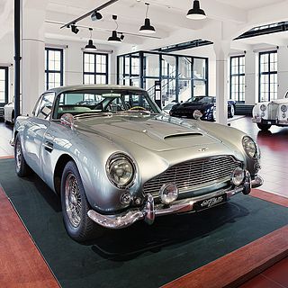 Classic Aston Martin DB5 on display at the Emil Frey Classic Center in Safenwil - photographed by Bluesun with a focus on design, lighting mood and attention to detail.