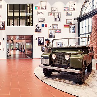 Historic 1954 Land Rover Series 1 owned by Sir Winston Churchill at the Emil Frey Museum in Safenwil – impactful exhibition photography by Bluesun with a focus on atmosphere and detail.