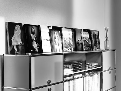 USM Haller sideboard showcasing high-end photo books and Bluesun magazines – reflecting our passion for photography and visual storytelling.